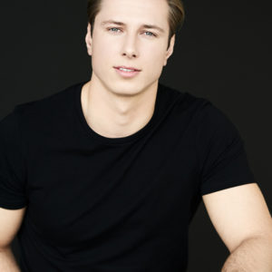 LAURI T.