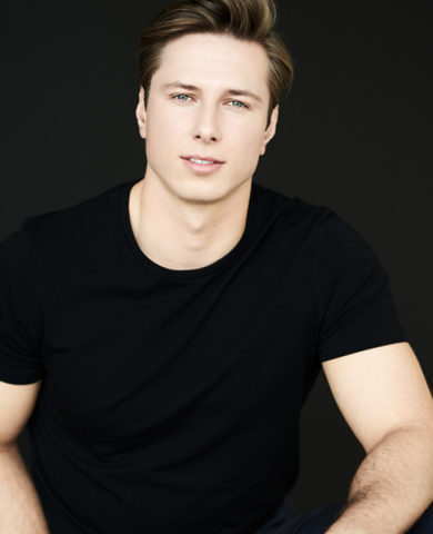 LAURI T.